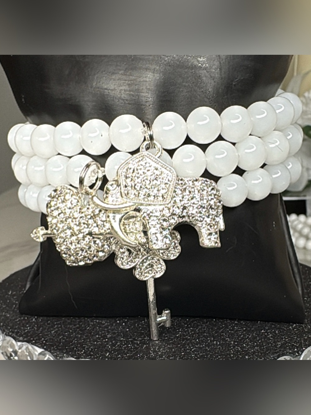 White Beaded Bracelet with Silver Elephant Charm